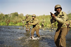 Derek Luke (right) leads the troops into combat.
