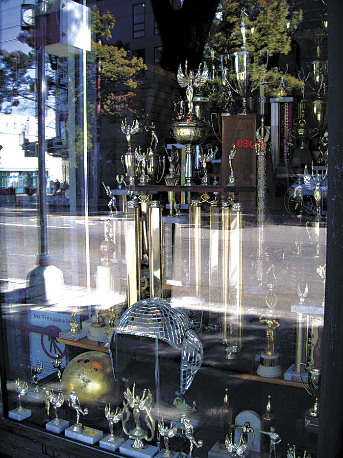 A shaggy, faux-fur couch, a pair of dancing dresses, and a video