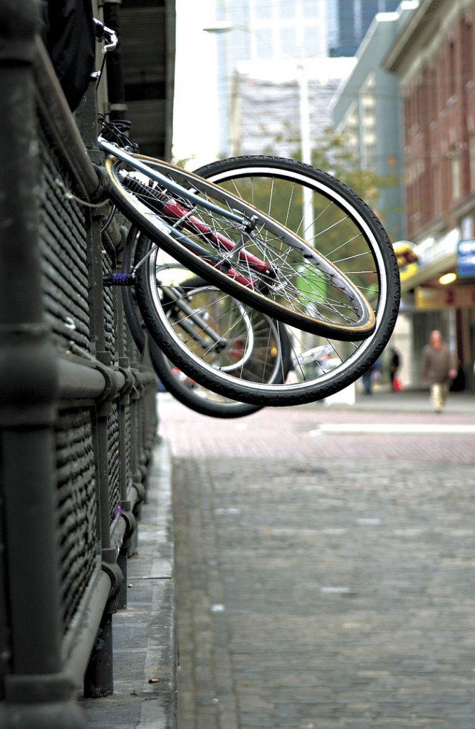 As this photo illustrates, the city is having trouble keeping up with the demand for bike racks.