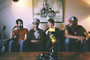 Henderson (in engineers cap) with his mates: I want everyone to have a wider range.