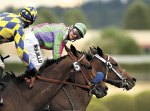 Hoonan-Trujillo (aboard horse #3) is the second-winningest female jockey in Emerald Downs History.