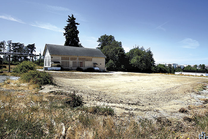 One resident complains that the most the Port does to maintain vacant parcels such as the Angle Lake property is cut the grass.