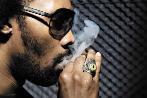 RZA smokes a join.&nbsp;.&nbsp;. well, something anyway.