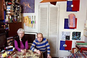 The collectors amid their collection.