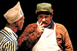 Whitehead (with Kevin McKeon at left) stoops to conquer.