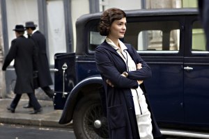 Tautou as early-20th-century career girl.