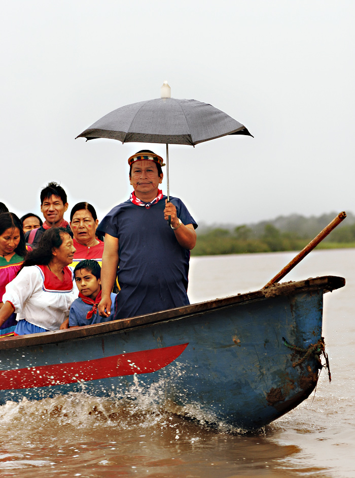 Members of the Cof&aacute;n patrol the Aguarico River.