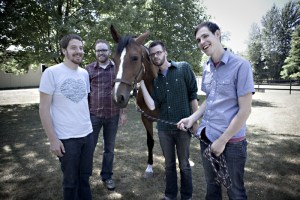 Awww . . . Crane (front left) and his friends like horsies too.