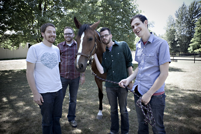 Awww . . . Crane (front left) and his friends like horsies too.