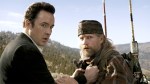 Its the end of the world, and you just knew Woody Harrelson (right) would be there with Cusack.