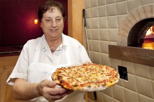 Mina Perry with one of her timeless, timely pizzas.