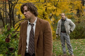 Bereaved parent Mark Wahlberg (left) with suspect-next-door Tucci.