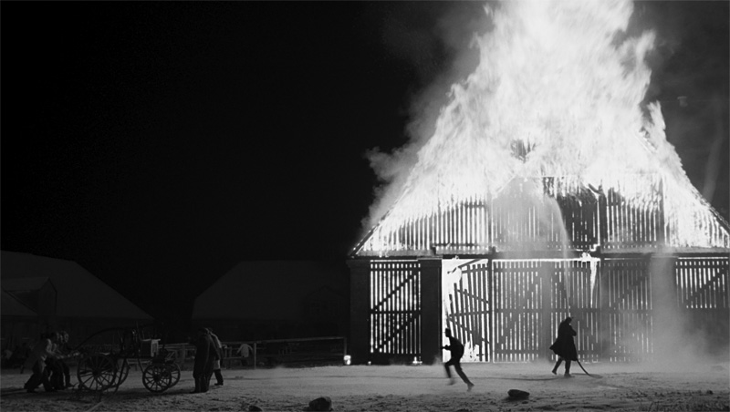 Haneke's village goes up in flames.