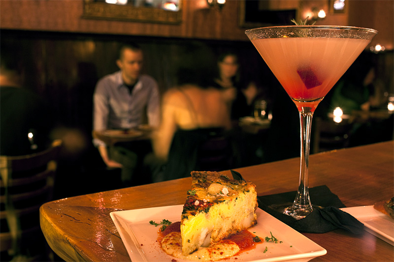 Tortilla Espanola and a fine cocktail at Ocho's bar.