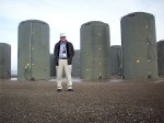 Jack Baker in front of the holding tanks for waste at the Columbia Generating Station: "You can hug one."