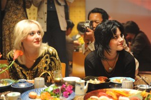 Fanning (left) and Stewart live the high life.