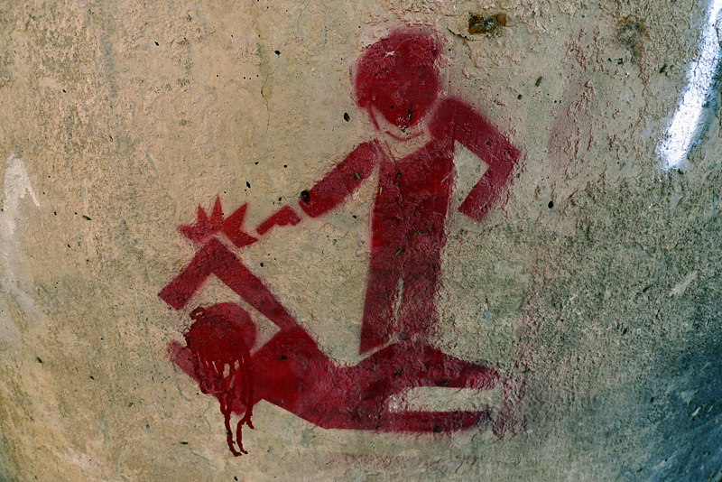 This graffiti stencil is common in Ju&aacute;rez. The image lines the wall of the nearly empty canal that borders the city and El Paso, Texas.