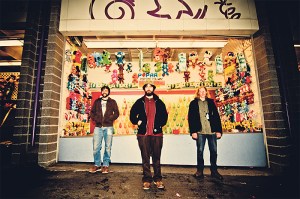 Fixing up the arcade: Murphy (center) and his mates, minus one.