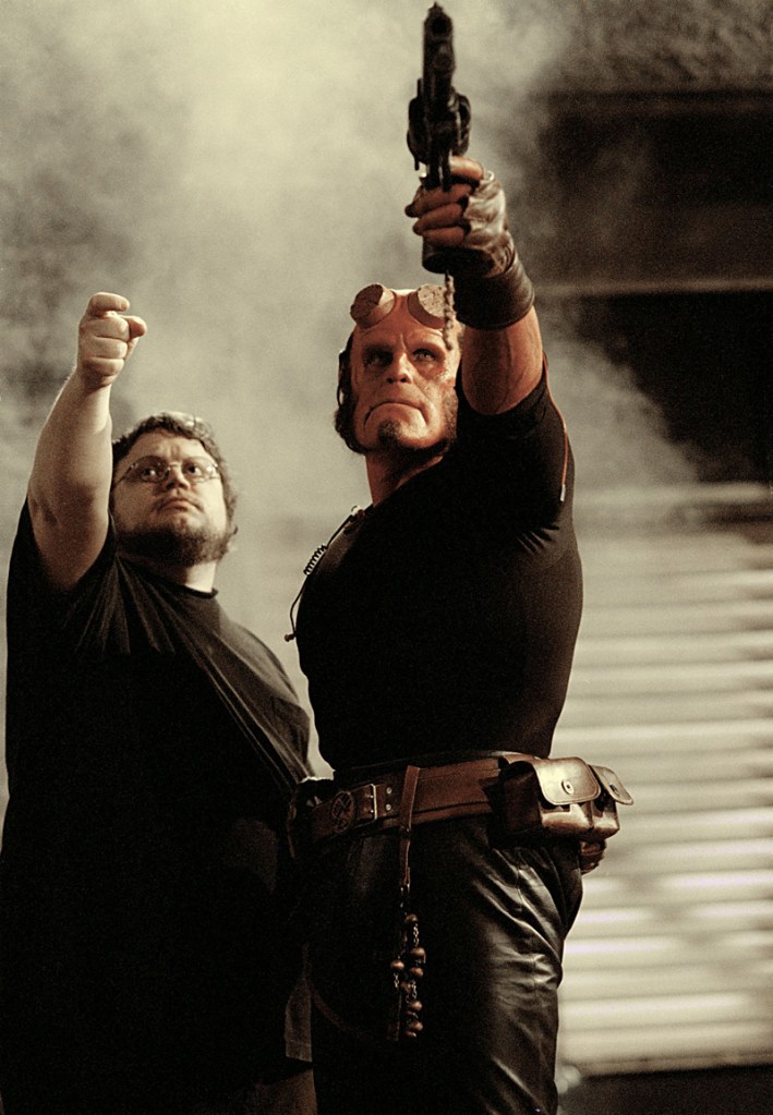 Del Toro (left) with Ron Perlman on the set of Hellboy.