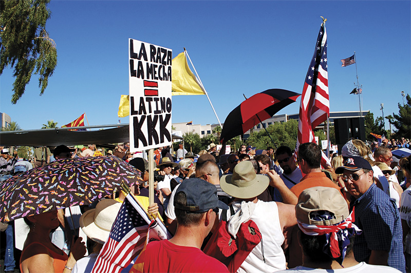 In the eye of the hurricane: protesters at an immigrationrally.