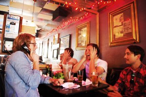 Schroeder (center, hands on head), looking buffaloed.