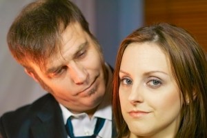 The old-school editor (Belyea) watches his reporter (Roberts) drift to the right.