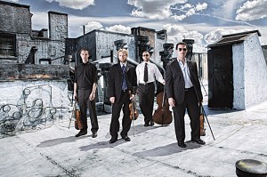 The Jack Quartet, looking like the cast of Law and Order: Chamber Music Unit.