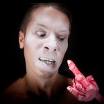 Loven confronts his wooden creations at OTB.