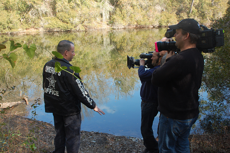 Lt. Damon Hall helps Herzog reconstruct the crime.