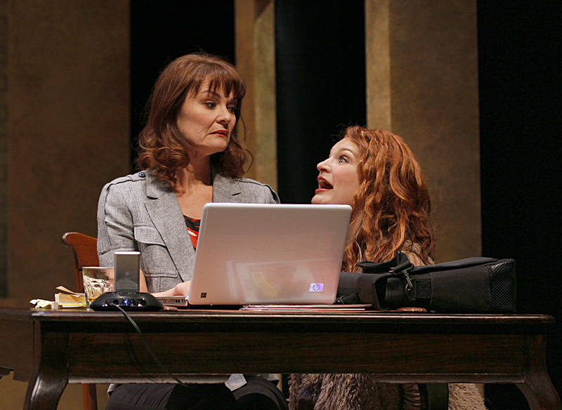 The new pet (Morris, right) ruffles her new owner (Nelson).