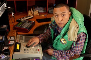 La, cozied up behind his other board.