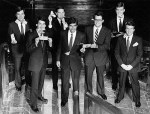 Romney (center) made plenty of dough at the expense of working-class jobs.
