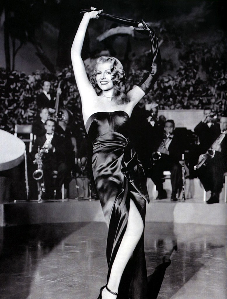 Hayworth doing her famous striptease.