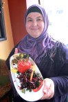 Left: A Turkish breakfast platter at Cafe Turko. Right: Sureyya Gokeri, Cafe Turko’s chef, poses with a Turkish dish.
