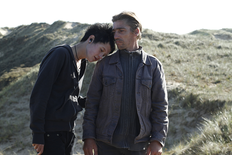 The girl (Lematre) and her protector (Dewaele).