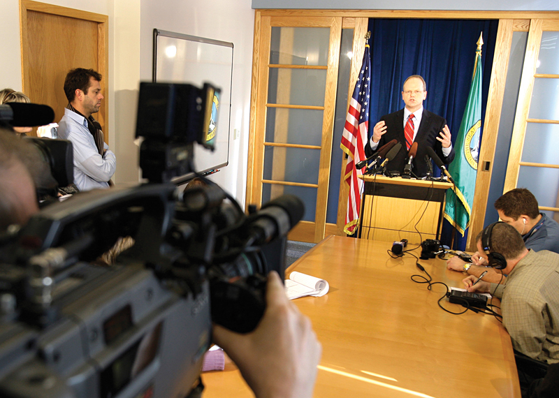 King County Prosecutor Dan Satterberg talks to reporters, Thursday, Nov. 12, 2009 in Seattle. Satterberg announced that Christopher Monfort, who is accused of fatally shooting a Seattle police officer on Halloween, would be charged with aggravated first-degree murder, a charge that could carry the death penalty. (AP Photo/Ted S. Warren)