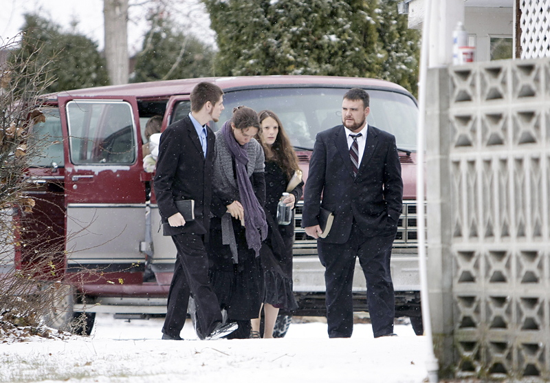 Family members of confessed serial killer Israel Keyes visit a funeral home Sunday, December 9, 2012, in Deer Park, Wash. Keyes confessed to killing eight people across the country before his December 2 suicide in a jail cell in Anchorage, Alaska.