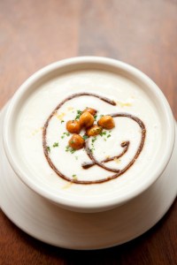 A cauliflower soup, scribbled with a brawny black olive vinaigrette, was thicker than its vegan profile would suggest. But like a gangster pummeling a rival who refuses to give up information, the kitchen had smacked the soup with so much salt in hopes of extracting flavor that it ultimately incapacitated the vulnerable vegetable.