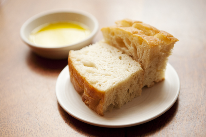 From the vantage point of a table set with drinks and a few slices of rustic housemade focaccia, yeasty and more wholesome-tasting than the typical dense focaccia, it seems impossible for the evening to go awry.