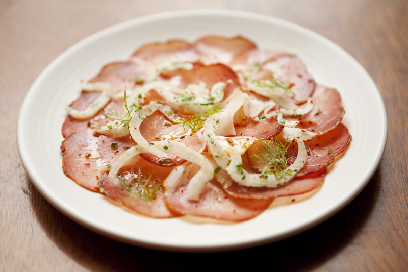 Order the rich house-cured pork loin, its fattiness cut by chili-flecked olive oil and age offset by twirls of fresh fennel.
