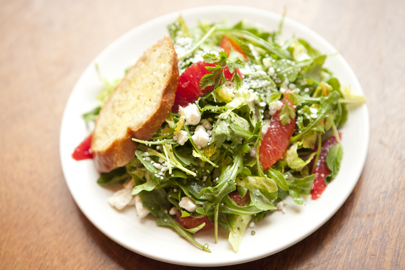 A spunky arugula salad dressed with blood orange segments and ricotta salata should also keep spirits up.