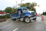 A Dump truck: Drunken Joy Ride in Stolen Dump Truck Leaves 1,400 without Power in Sleepy Colville