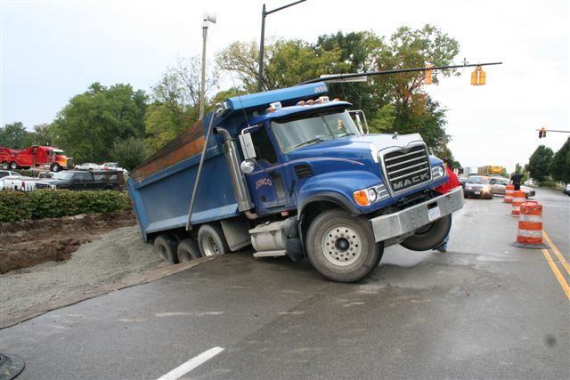 A Dump truck: Drunken Joy Ride in Stolen Dump Truck Leaves 1,400 without Power in Sleepy Colville