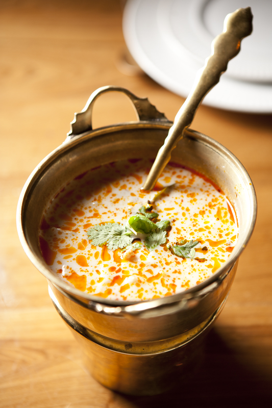 Thom ka soup, enticingly smooth and vaguely butterscotchy. The hot soup helps soften the chicken, which was brutally overcooked. Although thick sauces lessened the blow, chicken and beef were tough every time they appeared, whether in soups, noodles or fantastically velvety curries.