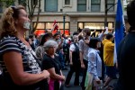 Occupy Seattle held a Silent Flash March at Westlake Park Monday -