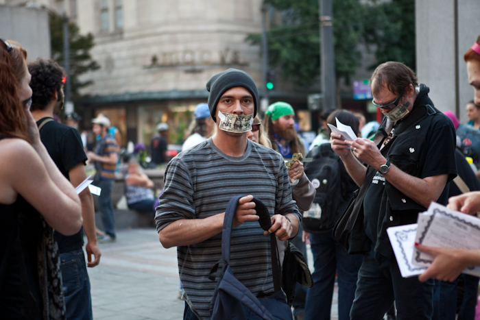 Occupy Seattle held a Silent Flash March at Westlake Park Monday -