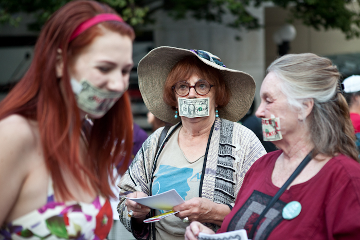 Occupy Seattle held a Silent Flash March at Westlake Park Monday -