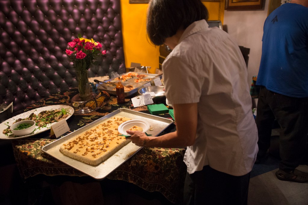 Helping herself to some Waxworm Flan.