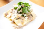 Short rib ravioli, with brown butter, goat cheese, shallots, mushrooms, and parsley.
