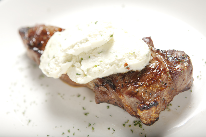 New York strip with Gorgonzola garlic butter.